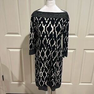 Sheath dress. Black and white, jersey knit dress. 3/4 length sleeve. Size 10